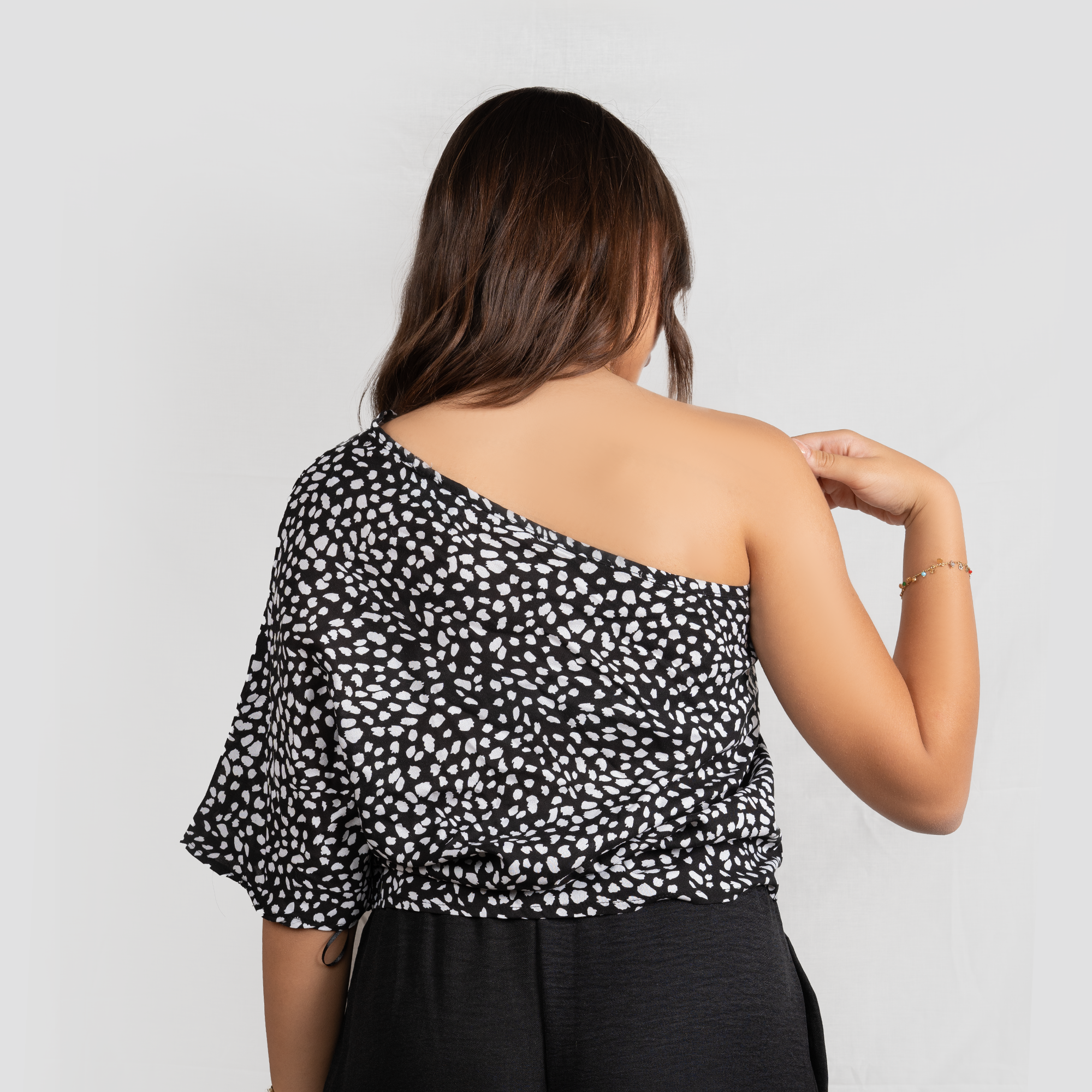Eclipse Dotted One-Shoulder Top